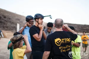 Group of boys fixing their devices on their heads